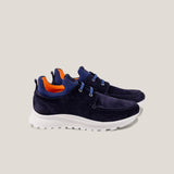 Navy suede laced design slip on sneakers with orange inner accents and a white sole